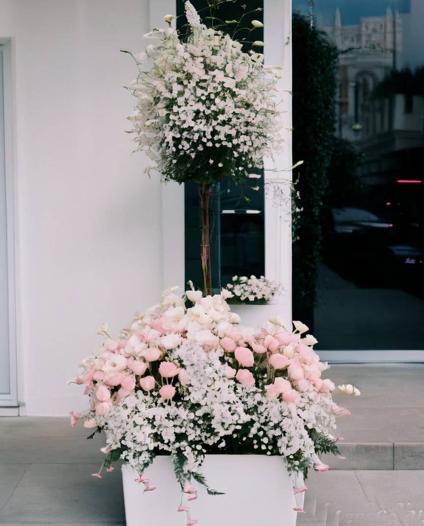 tall container white and pink flowers