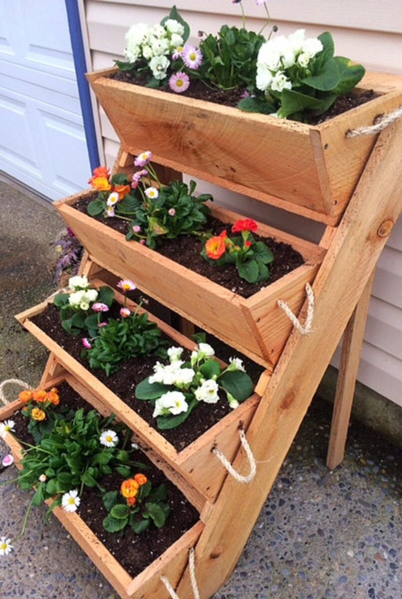 rustic outdoor ladder with crates